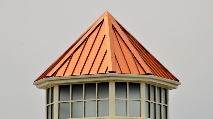 Copper color metal roof panels